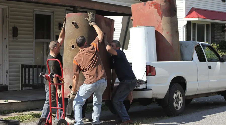 Workers Hauling Junk